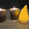 Kerstboom met elektrische waxinelichtje erin